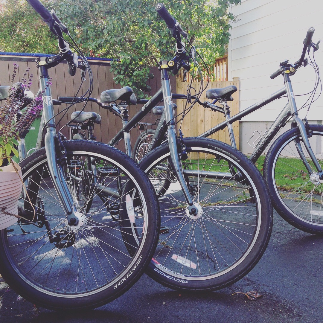 3 tandem bikes parked