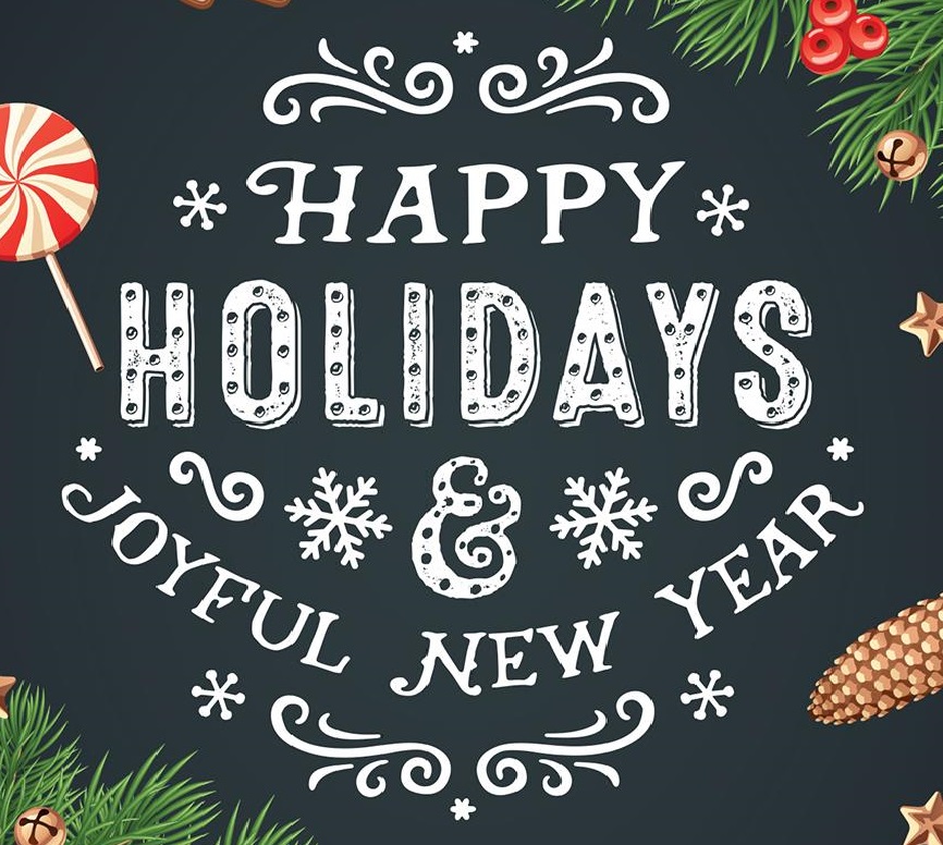 On a blackboard style background, the text Happy Holidays & Joyful New Year in chalk-style font, surrounded by evergreen garland, candy, and a pine cone