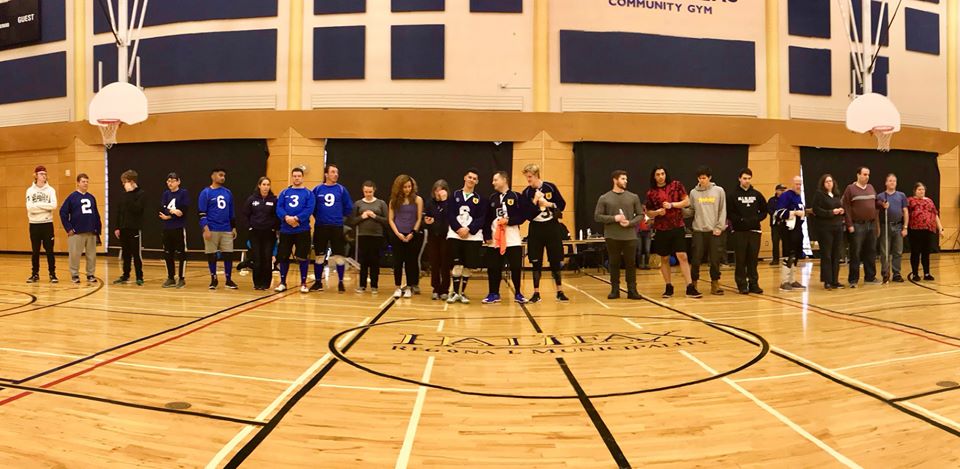 Group photo of all athletes & coaches at medals ceremony. From left to right: Bob Juniors; Quebec; NS Women; Nova Scotia; Ontario; Ship Recs